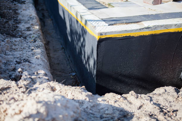Professional Waterproofing technician working in Bumpass, VA